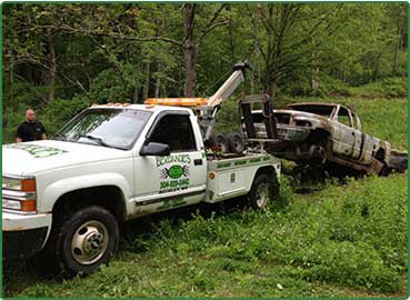 towing truck out of woods